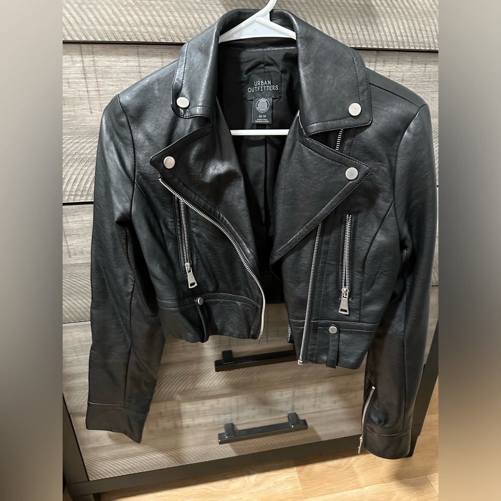 Urban outfitters cropped leather jacket in size xs.